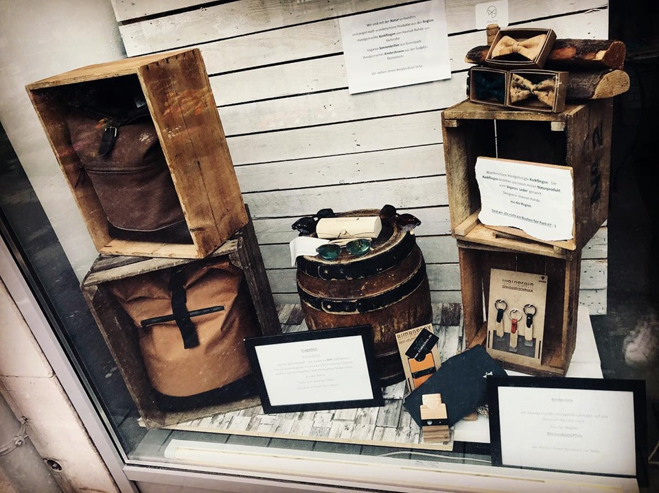 Holzsonnenbrillen, Holzgeldbeutel & Korkfliegen im Unikat Store Karlsruhe